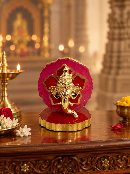 Handcrafted Golden Resin Ganesha Idol with Red Flower Backdrop | Spiritual Home Decor & Gift